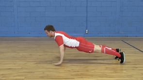Flexão com impulso – postura larga para curta